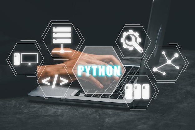 python programming languageman using laptop computer with python programming icon on virtual screen application and web development concept